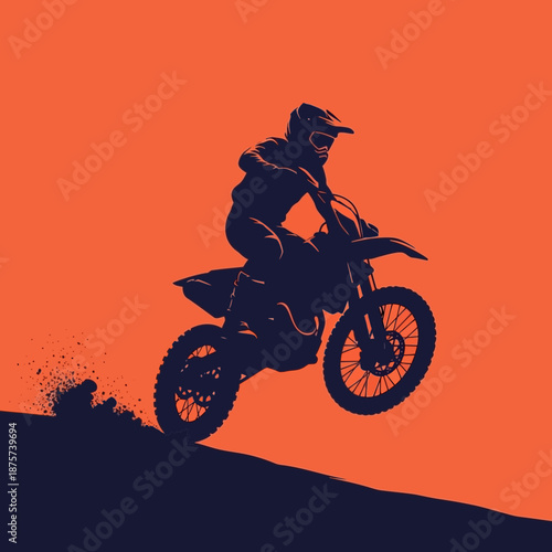 Motocross rider in action on orange background