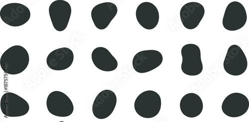 Collection of 20 black oval objects arranged in four rows on a white background