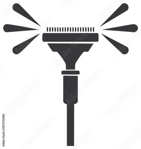 Black Watering Sprinkler Head Spraying Water Outward for Irrigation in Home Garden