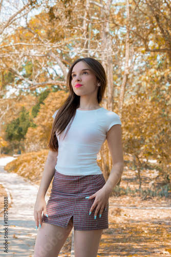 young woman in autumn park