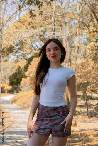 young woman in autumn park
