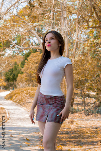 young woman in autumn park