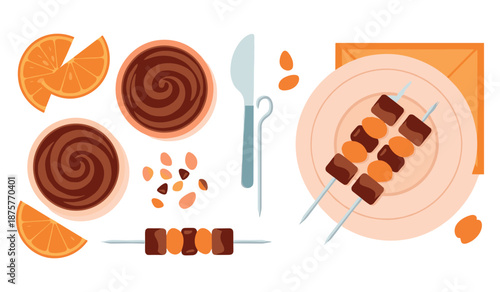 Top view of cinnamon rolls, sliced oranges, and skewered appetizers on a white background