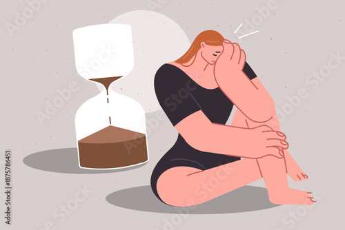 Tight deadlines negatively affect psychological state of girl crying, sitting near large hourglass