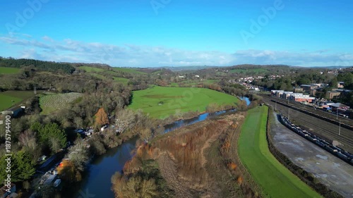 Exeter, Devon, England: DRONE VIEWS: The River Exe and the mainline railway track heading into Exeter St David's railway station. Exeter is the county town of Devon and pre-dates Roman times.