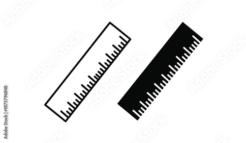 Two black rulers with markings on for measurement purposes in drafting or design
