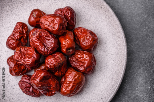 Tableau sur toile Red dried dates, the Chinese sweet fruit jujube, as a healthy food