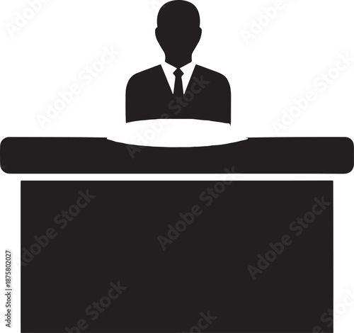 Businessman Standing Behind Reception Desk in Office
