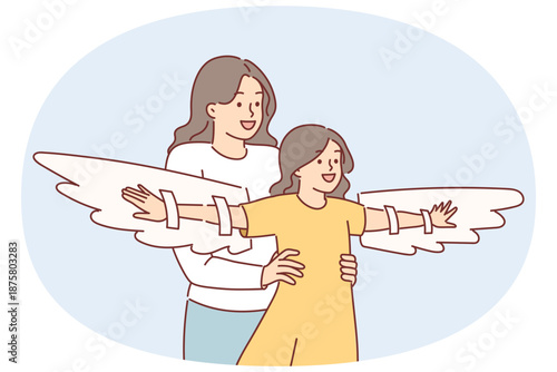 Mother plays with daughter using imaginary wings to motivate child to achieve goals