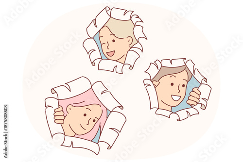 Happy schoolgirls make surprise by peeking out of holes in papers and peeking at you with curiosity