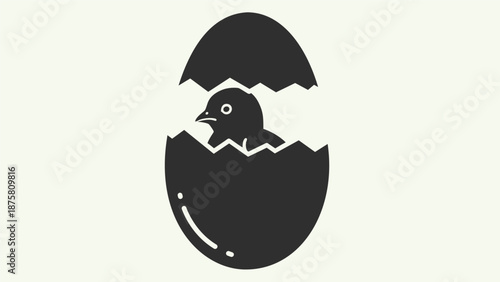Baby chick emerging from cracked eggshell illustration