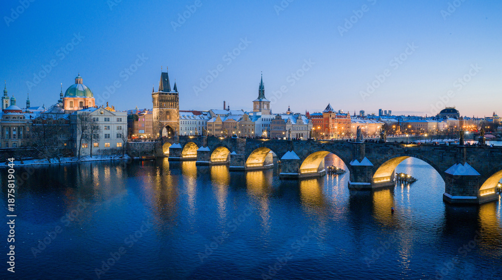 Fototapeta premium High Resolution Panorama Picture of Winter Snowy Prague Old Town with Prague Castle and Charles Bridge above River Vltava during Sunset , Czech republic