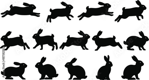 Black silhouettes of rabbits in various running and sitting positions