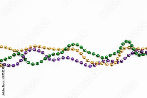 Obraz na plátne Mardi gras beads creating a colorful festive border