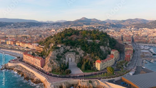 Sunset Coastal Panorama, Drone Captures Seaside Cityscape, Golden Hour View Of Port And Hills. Nice, France