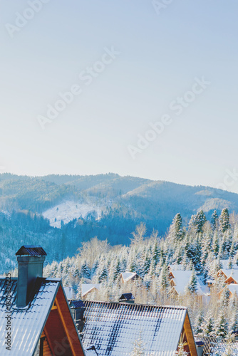 Snowy Mountain Chalets in a Winter Forest Village