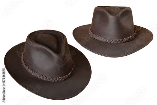 Cowboy-style leather hat with black ribbon isolated on a white background; natural leather hat for head protection for both men and women.