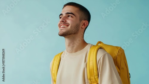 Wallpaper Mural Smiling man with backpack, looking at the camera. Torontodigital.ca