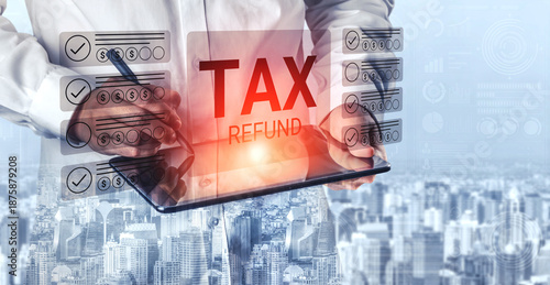 A professional examining a digital document related to tax refund. The backdrop features a city skyline, emphasizing finance and urban business themes. Gantry © InfiniteFlow