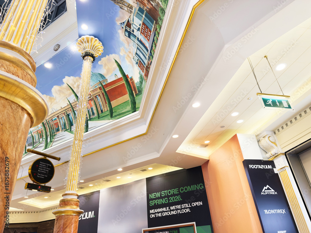 Fototapeta premium Elegant shopping Trafford Centre mall interior with decorative columns and painted ceiling in Manchester UK