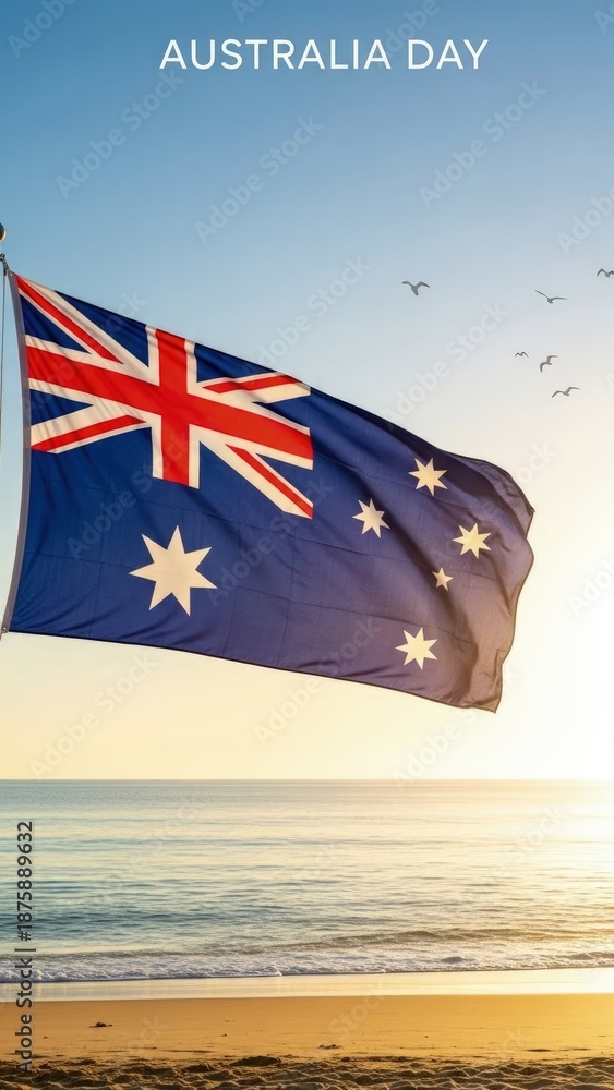 Fototapeta premium Australia Day celebration, national flag waving proudly, serene ocean waves, sandy beach shore, clear blue sky, flock of seagulls soaring, warm golden sunrise, patriotic spirit, commemorative occasion