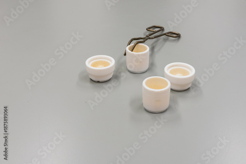 Forceps and grinding jars of mixer mills are used for the pulverization. Laboratory equipment.