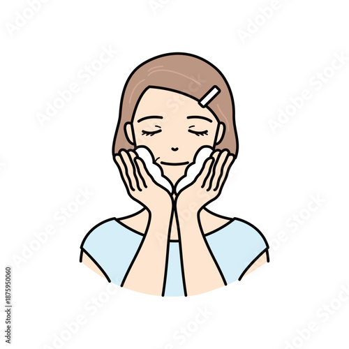 Senior woman gently washing her face with thick soap foam