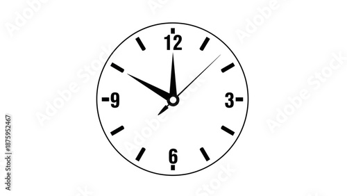 Simple black and white analog clock showing five minutes to twelve.