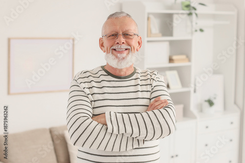 Portrait of happy senior ma...