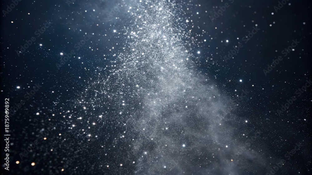 Fototapeta premium A mesmerizing view of sparkling cosmic particles against a dark backdrop, evoking a sense of wonder and the vastness of the universe.
