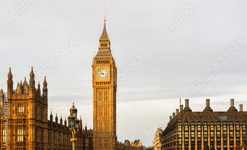 Elizabeth Tower standing tall with Houses of Parliament, iconic London landmark representing travel and history