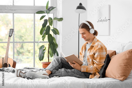 Young man with headphones r...