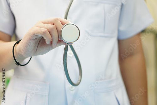 Medical Staff Holding Stethoscope Ready for Healthcare Work