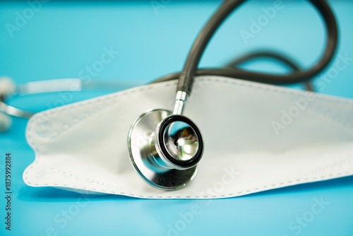 Stethoscope on medical mask in healthcare workplace