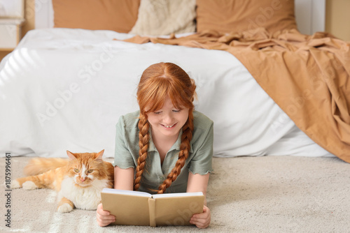 Teenage redhead girl with c...