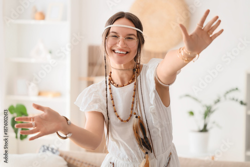 Young happy female hippie o...