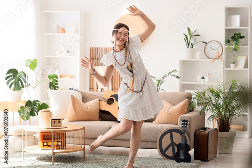 Young happy female hippie w...