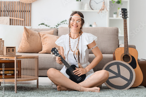 Young happy female hippie w...