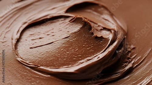 Close up of rich creamy chocolate frosting swirled together