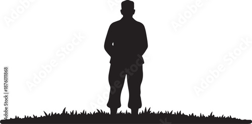 Silhouette of a man standing on grassy hill landscape