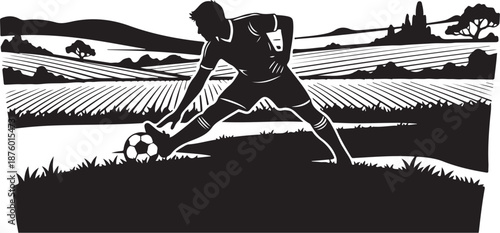 Silhouette of soccer player kicking ball in rural landscape