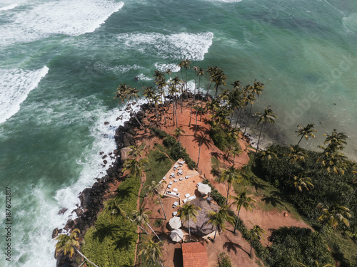 Tropical resort nestled on a cliff overlooking the ocean in Sri Lanka