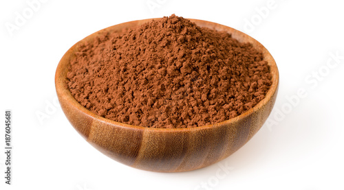 Raw cocoa powder in the wooden bowl, isolated on white background.