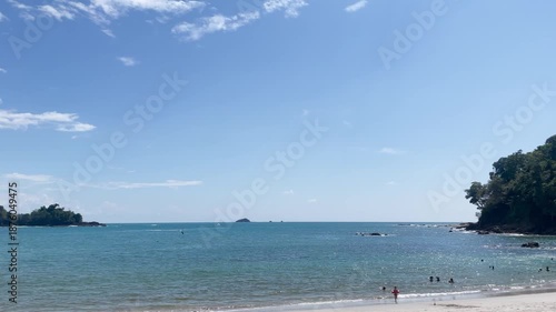 People on the beach in Costa Rica. Tourists on the Pacific coast of Costa Rica.