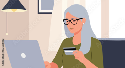 Elderly woman with glasses and gray hair using a laptop and credit card for online shopping or banking