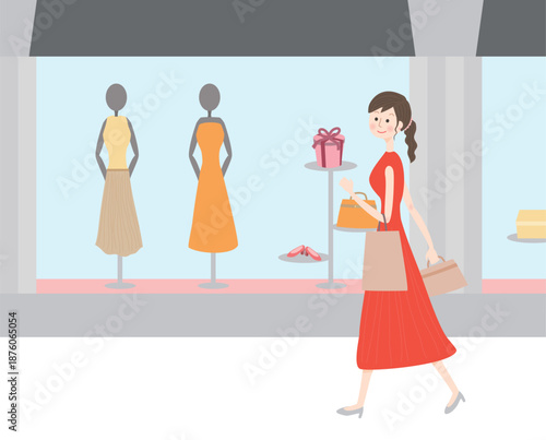 ウインドウショッピングをする女性