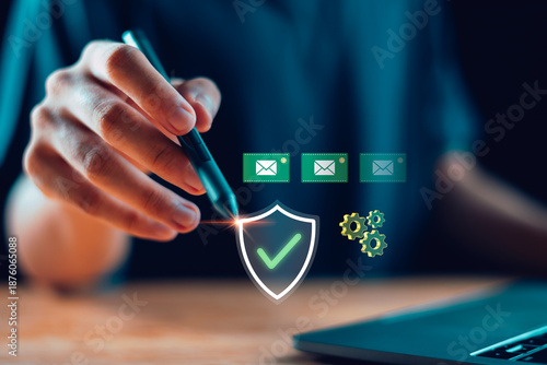 Wallpaper Mural A glowing digital shield icon with email and gear symbols represents secure communication, email protection, cybersecurity systems, and modern digital data security in a connected tech environment. Torontodigital.ca