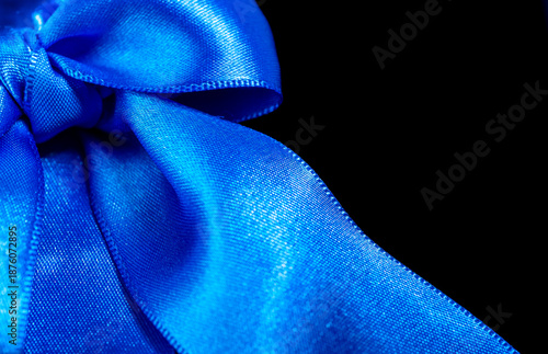 blue bow isolated on black