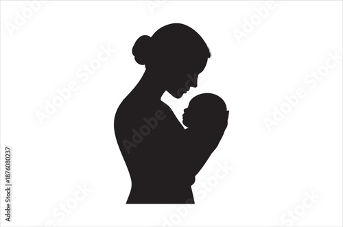 silhouette of a mother holding her baby close to her chest
