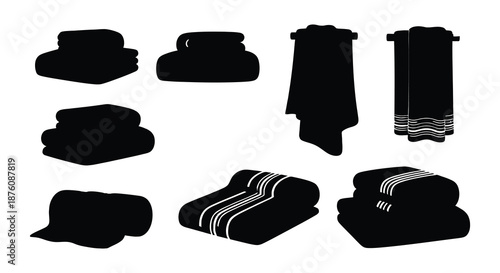 A collection of black towels in various folded and hanging positions